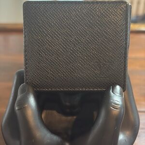 LOUIS VUITTON Taiga Porto Bié Coin Holder